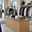 Clothing displays in a naturally lit retail store